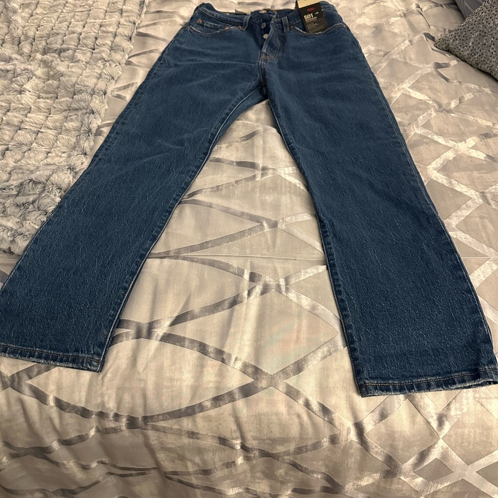 Women’s Medium-Wash Levi’s 501 Original Jeans. Size: W27 L28.